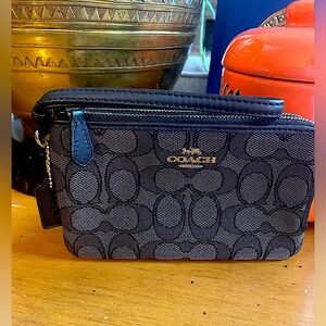 Coach Black double zipper wristlet/ wallet. Signature “C” fabric. EUC.